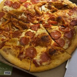 A sad Paisanos's pepperoni pizza. We ordered the 2 pizza special and both were pretty bad looking and worse tasting. A sad Paisanos's pepperoni pizza. We ordered the 2 pizza special and both were pretty bad looking and worse tasting.