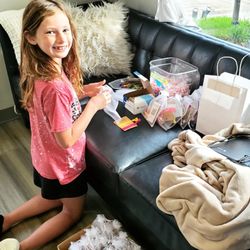 Live Oak Salon - Little helper making goodie bags for rice harvest festival!