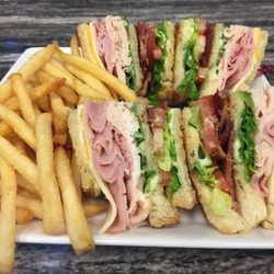 Clubhouse Grill - Club Sandwich perfected by the Clubhouse Grill.