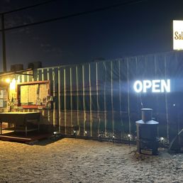 Exterior outside entrance of Salty Heifer Grill - The Salty Heifer is basically a carry out place that operates completely out of a shipping container - Safford, Arizona Exterior outside entrance of Salty Heifer Grill - The Salty Heifer is basically a carry out place that operates completely out of a shipping container - Safford, Arizona