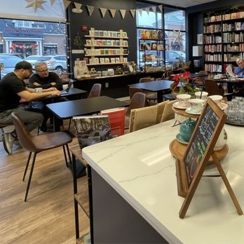 Wyrd Bookstore - people sitting at tables in a bookstore - Bookstores Near Me - Edgewater, Maryland Wyrd Bookstore - people sitting at tables in a bookstore - Bookstores Near Me - Edgewater, Maryland