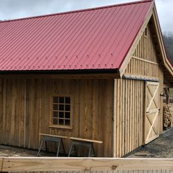 Southern Quality Company - Snow and ice guards installed with this new red metal roof by Southern Quality Company.