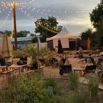 Central Machine Works Brewery and Beer Hall - Patio with movie screen - Breweries Near Me - Austin, Texas Central Machine Works Brewery and Beer Hall - Patio with movie screen - Breweries Near Me - Austin, Texas