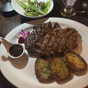 Holstein Grill Steak House - Rib eye steak and roasted potatoes - Steakhouses Near Me - Ronkonkoma, New York Holstein Grill Steak House - Rib eye steak and roasted potatoes - Steakhouses Near Me - Ronkonkoma, New York