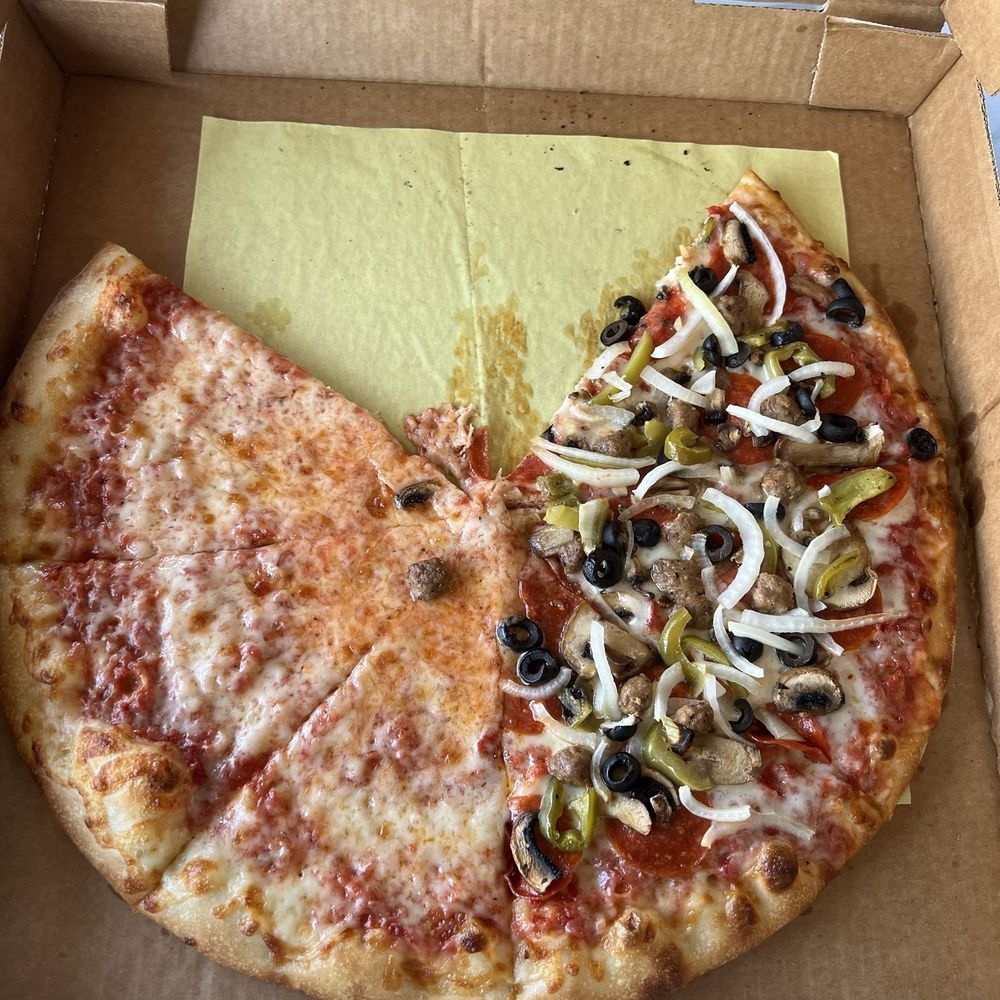 Massimos Pizza and Pasta - Left - Half Cheese & Right - Massimo Special (Pepperoni, Sausage, Olives, Onions, Green Bell Peppers, Mushrooms) - Pizza Near Me - Costa Mesa, California Massimos Pizza and Pasta - Left - Half Cheese & Right - Massimo Special (Pepperoni, Sausage, Olives, Onions, Green Bell Peppers, Mushrooms) - Pizza Near Me - Costa Mesa, California