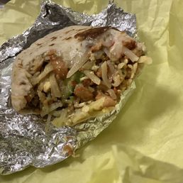 Alllll those ONIONS, uncooked and chewy/crispy. And where is the chicken in this breakfast burrito with chicken? Alllll those ONIONS, uncooked and chewy/crispy. And where is the chicken in this breakfast burrito with chicken?