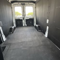 Hertz Rent A Car - Inside cargo van. Clean and roomy for more than a queen size mattress.