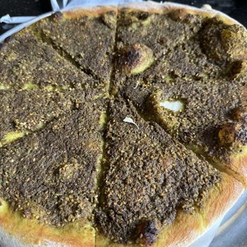 Amir Grill - a whole pizza on a plate - Lebanese Near Me - Golden, Colorado