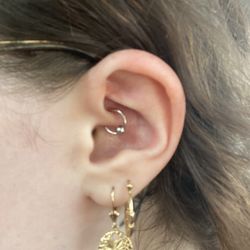 Vermont Custom Tattoo and Piercing - Daith piercing by Julie