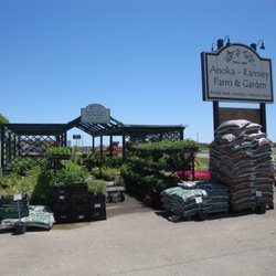 Main sign and some of the smaller ornamental plants & veggies, adjacent to Highway 10.