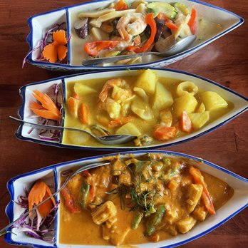 Thai Chili - Top to bottom Mixed seafood with green curry, mixed seafood with yellow curry and Panang Salmon red curry. - Thai Near Me - Reno, Nevada Thai Chili - Top to bottom Mixed seafood with green curry, mixed seafood with yellow curry and Panang Salmon red curry. - Thai Near Me - Reno, Nevada