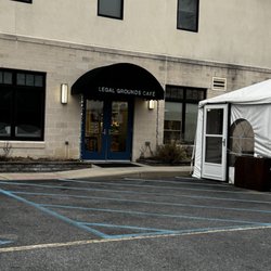 Back entrance with a heated patio