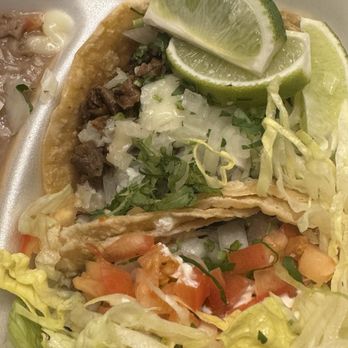Spicy Taco - Taco with onions and cilantro that I did not order - Tacos Near Me - Chicago, Illinois