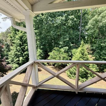 Veras Remodeling & Construction - Replaced wire railing with cedar and whitewashed to match the ceiling (that you can't see in picture) as well as stained deck/stairs. - General Contractors Near Me - Kennesaw, Georgia