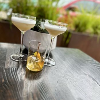 Copper Spirit Distillery - two cocktails on a wooden table - Distilleries Near Me - Bowen Island, British Columbia Copper Spirit Distillery - two cocktails on a wooden table - Distilleries Near Me - Bowen Island, British Columbia