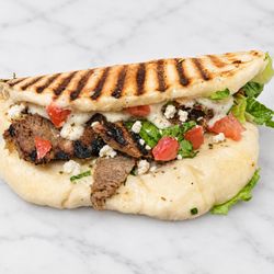 ZamZamz Mediterranean Grill - Greek Philly -- A hot, pressed Mediterranean pita melt with mozzarella, feta and oregano.