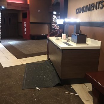 AMC Superstition East 12 - Simple sweep job every once in a while will do. This mess was there when we arrived and when we left! - Cinema Near Me - Mesa, Arizona