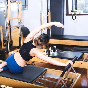 Lemon Tree Wellness - Mermaid side stretches - Pilates Near Me - Portland, Oregon