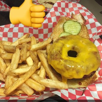 Chandler's Burger Bistro - Highlander burger - onion rings on top with cheddar and BBQ sauce - American Near Me - Cincinnati, Ohio Chandler's Burger Bistro - Highlander burger - onion rings on top with cheddar and BBQ sauce - American Near Me - Cincinnati, Ohio