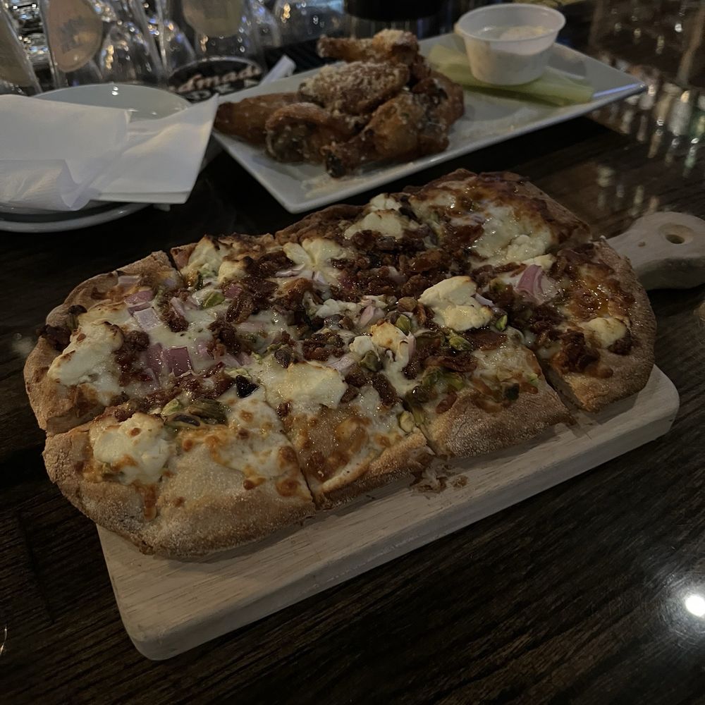 James Madison's Pub - The goat cheese and pistachio flatbread and chicken wings - American Near Me - Madison, Connecticut James Madison's Pub - The goat cheese and pistachio flatbread and chicken wings - American Near Me - Madison, Connecticut