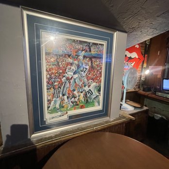 King Street Bar and Oven - a painting of a football game - Bars Near Me - Seattle, Washington