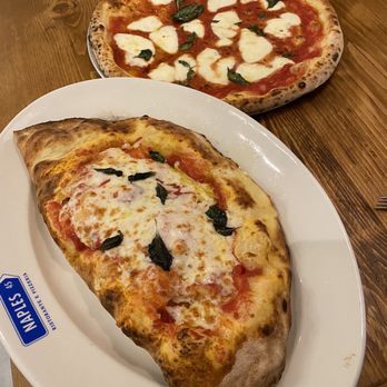 Simply Capri - Margherita pizza and a calzone amazing - Italian Near Me - Winter Garden, Florida Simply Capri - Margherita pizza and a calzone amazing - Italian Near Me - Winter Garden, Florida