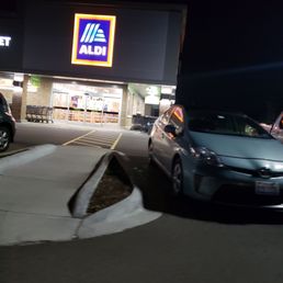 a car parked in front of a store