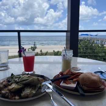 Beach House - Grilled Caesar salad with blackened shrimp and a catch of the day sandwich - Bars Near Me - Pompano Beach, Florida