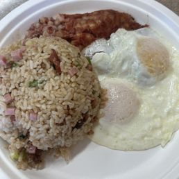 Corn beef hash with over easy eggs and fried rice Corn beef hash with over easy eggs and fried rice