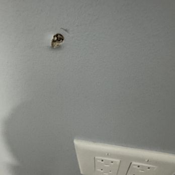 OnPoint Creations - holes from damage just left - Drywall Installation & Repair Near Me - Oswego, Illinois