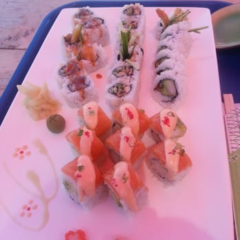 Big Catch Sushi - Mmmm Sushi! Spicy Tuna, Unagi, Dynamite & Passion Roll (top left to bottom) #bigcatch #sushi - Japanese Near Me - Calgary, Alberta