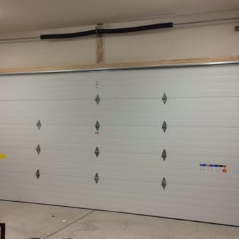 Door Pros - Inside of the Clopay door showing high rise track - Garage Door Services Near Me - Palm Desert, California