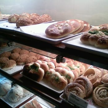 85°C Bakery Cafe-Irvine - Shelf full of pastries - Coffee & Tea Near Me - Irvine, California