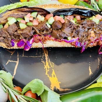 Mesubbim Express - Our Signature pulled beef on fresh toasted baguette with a variety of our fresh salad fixings. Our Beef is cooked all day low and slow. - Sandwiches Near Me - Boca Raton, Florida Mesubbim Express - Our Signature pulled beef on fresh toasted baguette with a variety of our fresh salad fixings. Our Beef is cooked all day low and slow. - Sandwiches Near Me - Boca Raton, Florida