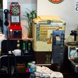 Taste of Brazil Authentic Brazilian Cuisine - Pay Phone and Coffee Machine