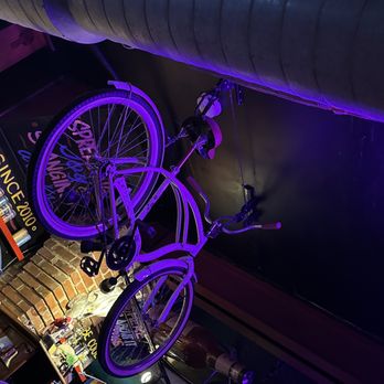 HandleBar - a purple bicycle hanging from the ceiling - Pizza Near Me - St Louis, Missouri HandleBar - a purple bicycle hanging from the ceiling - Pizza Near Me - St Louis, Missouri