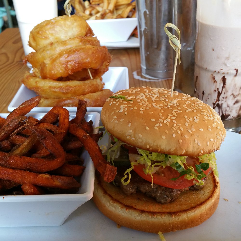 Uneeda Burger - Classic burger with sweet potato fries, onion rings, and chocolate shake. - Burgers Near Me - Seattle, Washington