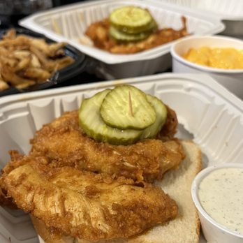 The Barrel & Bottle - a chicken sandwich with a pickle on top - Beer, Wine & Spirits Near Me - Columbus, Ohio