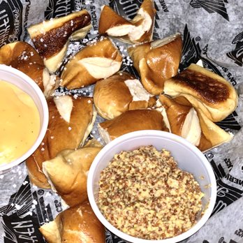 Regal Warren Moore - Pretzels with cheese and very course mustard. - Dinner Theater Near Me - Moore, Oklahoma Regal Warren Moore - Pretzels with cheese and very course mustard. - Dinner Theater Near Me - Moore, Oklahoma