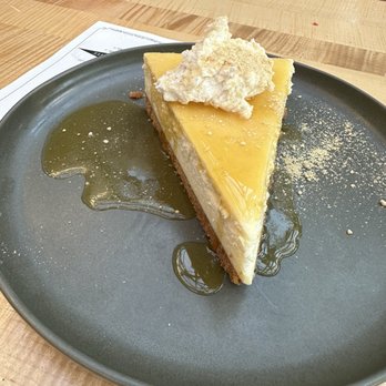 Jaja - Cheesecake with passionfruit topping - Cocktail Bars Near Me - Cleveland, Ohio Jaja - Cheesecake with passionfruit topping - Cocktail Bars Near Me - Cleveland, Ohio