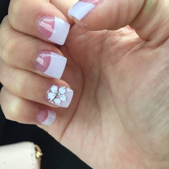 Tammy Nails - My favorite. White tips and a white flower - Nail Salons Near Me - Chico, California