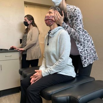 Pure Life Chiropractic - Dr. Pam getting her first adjustment at PLC! - Chiropractors Near Me - Eugene, Oregon