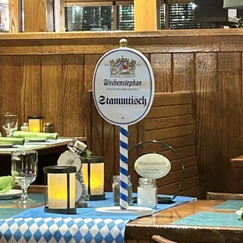 Spargel On 9 - a restaurant table with a sign - German Near Me - Queensbury, New York