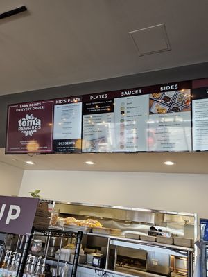 Toma Mojo Grill by null
