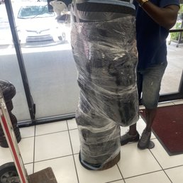 Exterior outside entrance of G.O.A.T Movers - Wrapped up a head - North Miami beach, Florida Exterior outside entrance of G.O.A.T Movers - Wrapped up a head - North Miami beach, Florida