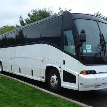 Michigan Motorcoach - 56 Passenger Motorcoach - Airport Shuttles Near Me - Commerce Township, Michigan Michigan Motorcoach - 56 Passenger Motorcoach - Airport Shuttles Near Me - Commerce Township, Michigan
