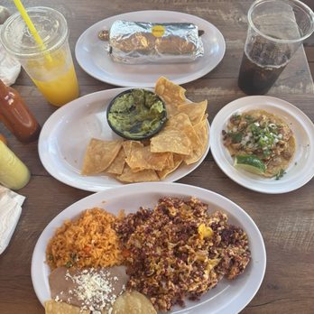 Fonda Doña Loca - Breakfast Burrito, chips and guacamole, chicken taco, chorizo and eggs, mango juice - Mexican Near Me - Temecula, California Fonda Doña Loca - Breakfast Burrito, chips and guacamole, chicken taco, chorizo and eggs, mango juice - Mexican Near Me - Temecula, California