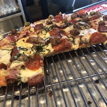Old Chicago Pizza + Taproom - Meaty thin crust - crunchy goodness - Pizza Near Me - Chandler, Arizona Old Chicago Pizza + Taproom - Meaty thin crust - crunchy goodness - Pizza Near Me - Chandler, Arizona