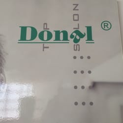 Donal Top Salon - La foto del logo