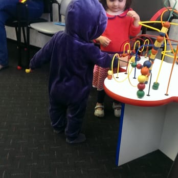 ABQ Pediatric Dentistry: Spencer J. Tasker, DMD - Playing at the toddler table! - Pediatric Dentists Near Me - Albuquerque, New Mexico